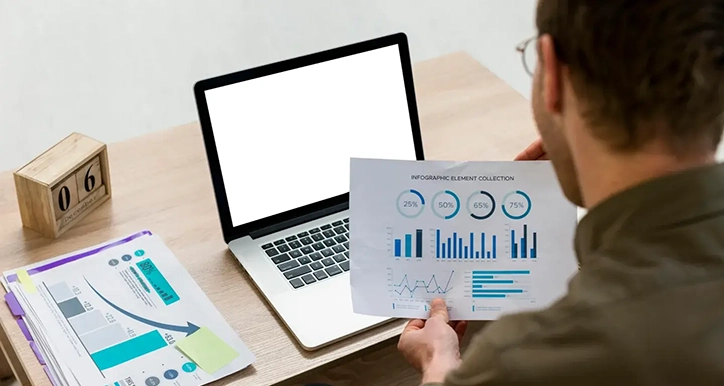 man-working-with-infographics-indoors